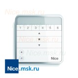 Настенный передатчик NICE W6S для управления до 6 групп с отдельными командами "Вверх-стоп-Вниз" Клавиша для активации/деактивации климатических датчиков